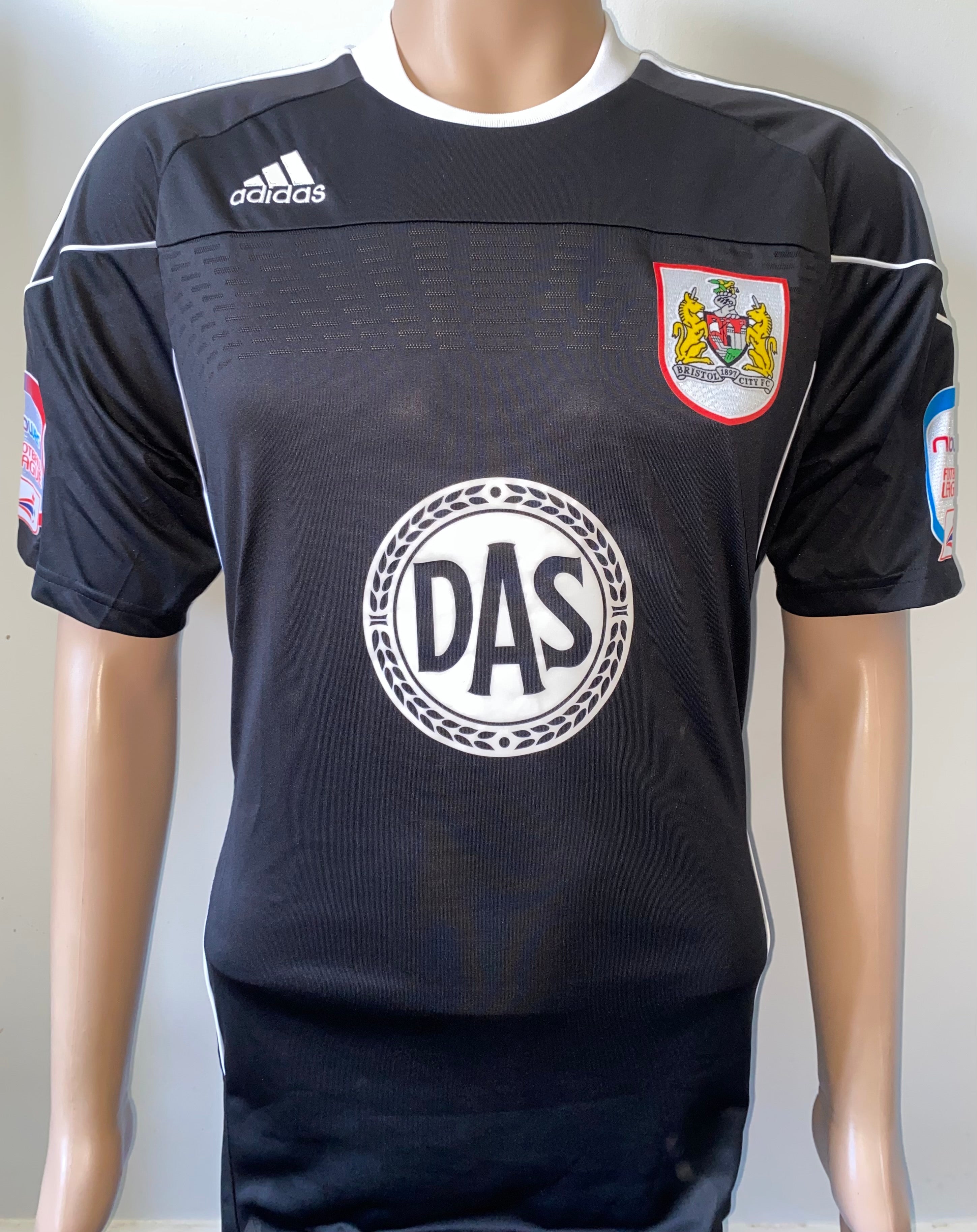 2010/11 MATCH WORN AND SIGNED BRISTOL CITY THIRD SHIRT (HAYNES #11)