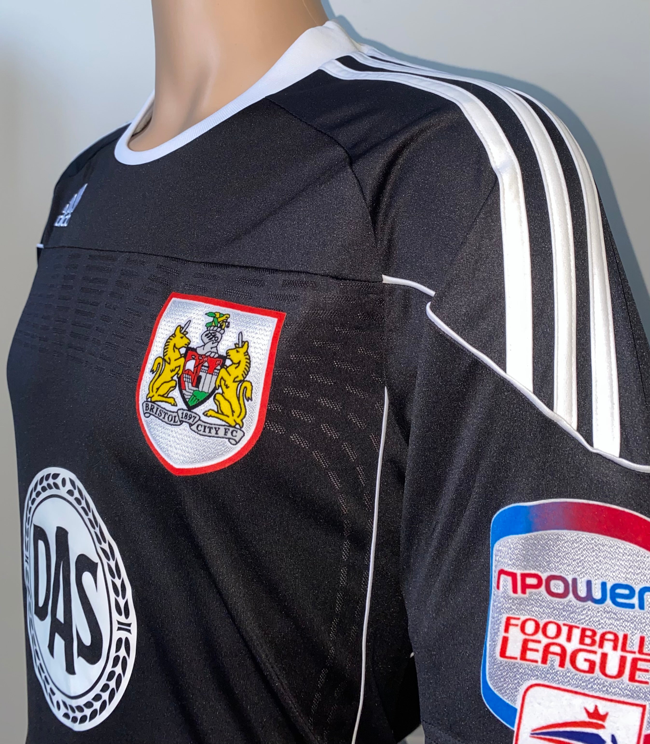 2010/11 MATCH WORN AND SIGNED BRISTOL CITY THIRD SHIRT (HAYNES #11)