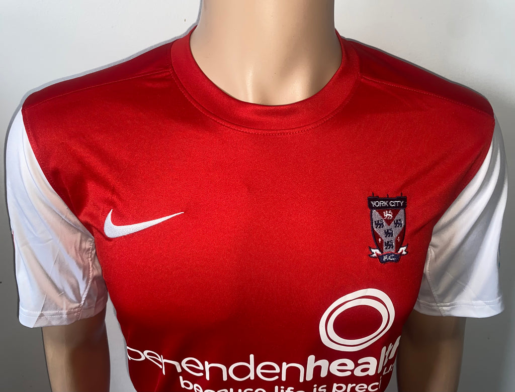 2010/11 YORK CITY MATCH WORN HOME SHIRT (MCDERMOTT #23)