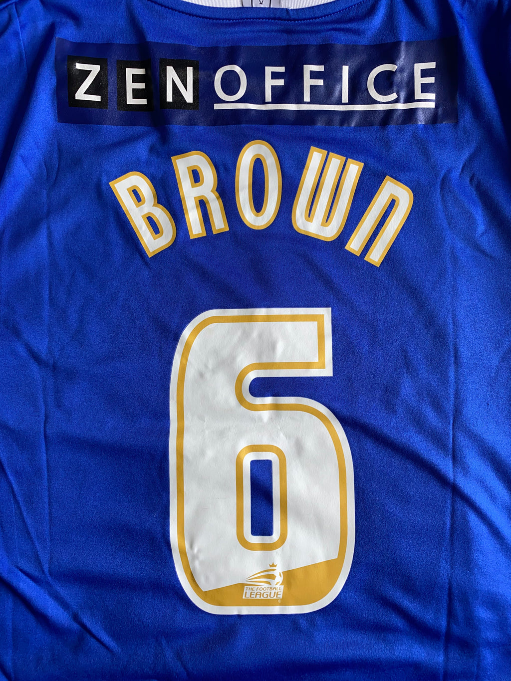 2011/12 OLDHAM ATHLETIC MATCH WORN HOME SHIRT (BROWN #6)