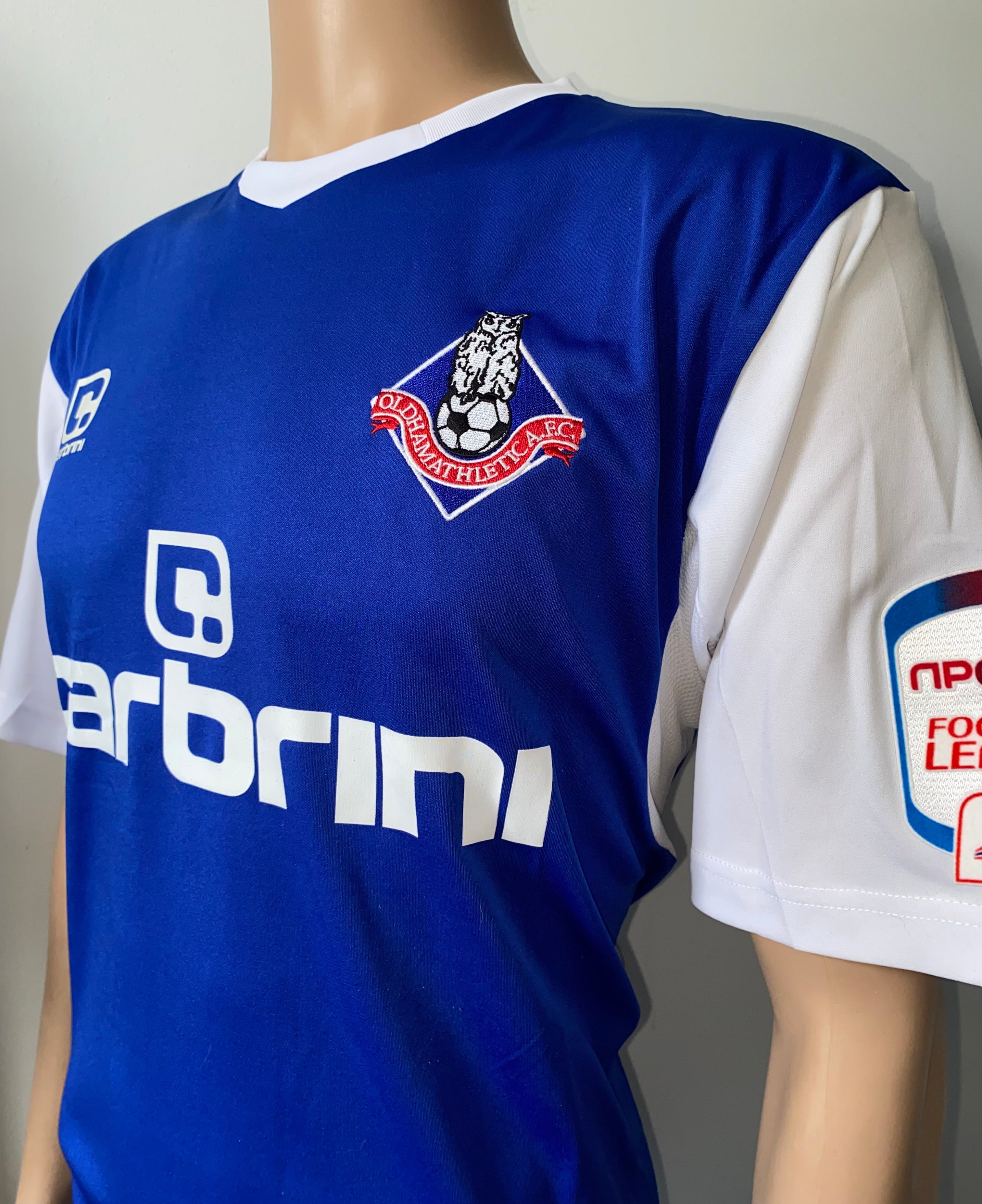 2011/12 OLDHAM ATHLETIC MATCH WORN HOME SHIRT (BROWN #6)